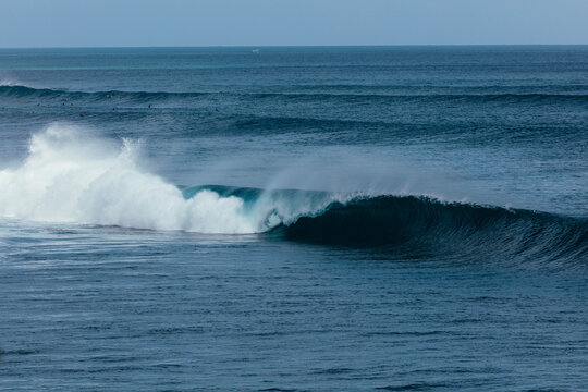 Breaking wave on tropical island 