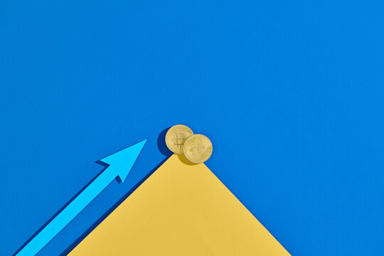 Bitcoin Price Fluctuation On yellow Graph Background