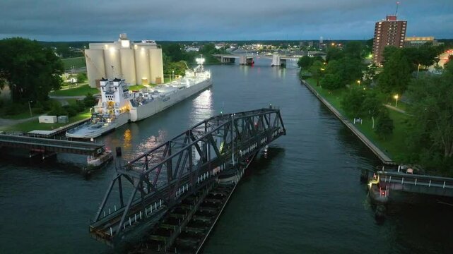 Aerial of St. Joseph Swing Bridge at Golden Hour with Docked Vessel