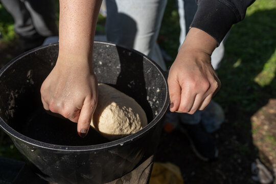 Outdoor Campfire Bread Making Process With Dough And Flatbreads
