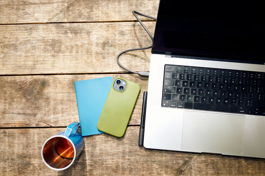 Laptop on a wooden table