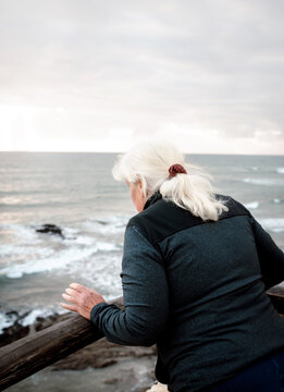Senior Woman Looking at Ocean 