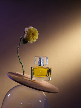 perfume in a glass bottle with yellow rose fragrance