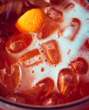 Closeup of Icy Orange Spritz Cocktail With a Slice of Orange