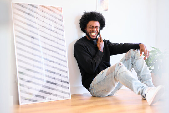 Man Laughing on Phone