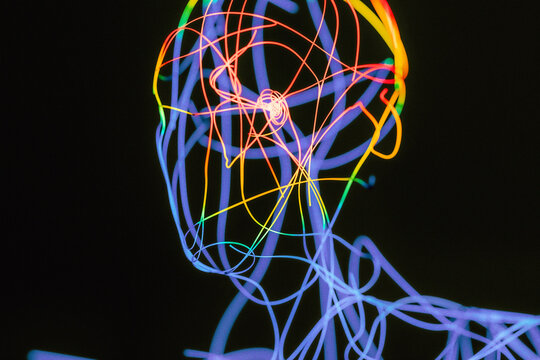 Lines of Light Forming a Scary Neon Face Silhouette
