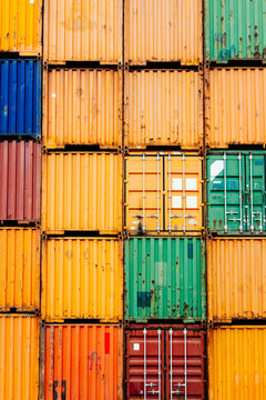 A Wall of Shipping Containers at a Port