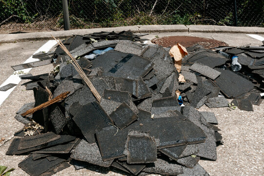 Stacked Roof Shingles After Hurricane Winds
