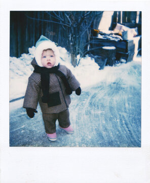 A child dressed in winter clothes