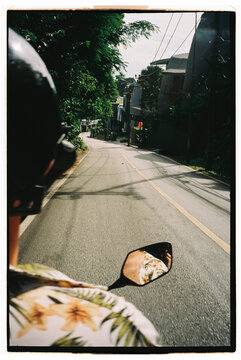 Couple traveling by motorbike in Asia 