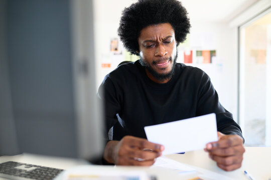 Man Reviewing Document on POV Video Call