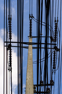 Utility poles at sunset