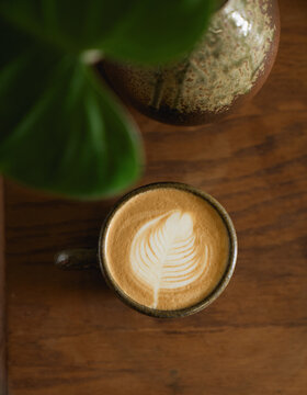 Coffee Latte on wooden table.