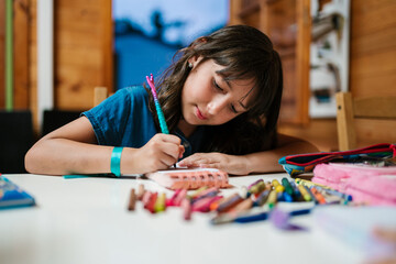 Focused Girl Drawing