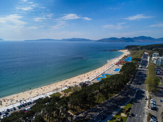Aerial view of Playa de Samil, the main beach of Vigo in Galicia in northwest Spain. Sunny day,...