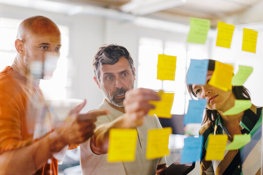 Business team having meeting brainstorming using sticky notes