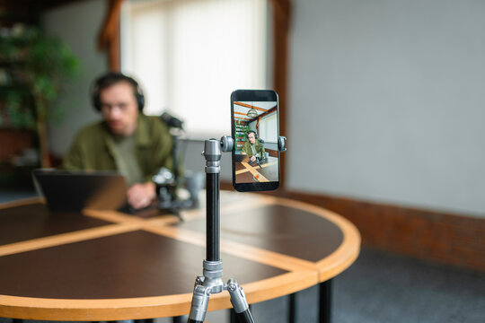 A man records a video blog