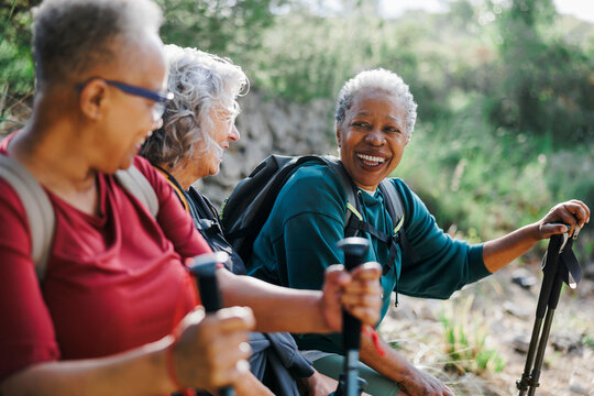 Senior women taking a break during hiking day
