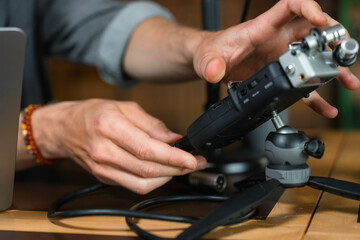 The man sets up the equipment