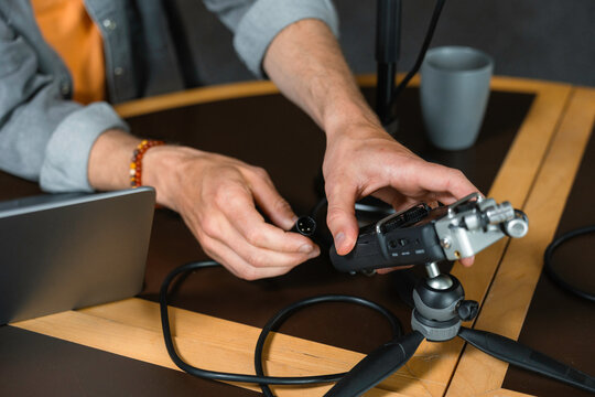 The man sets up the equipment