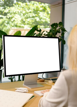 Woman Works in An Office Mockup Display with white scree.