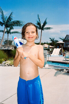 Smiling boy at the pool