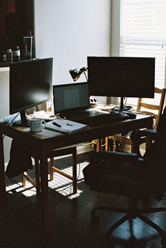 Messy home office desk 