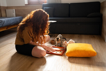 Woman Playing with Cat