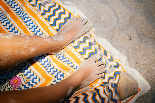 Relaxing Feet On Beach Towel