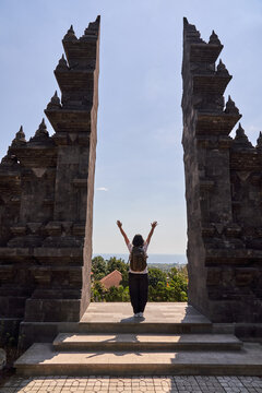 Woman in a beatiful temple in Bali