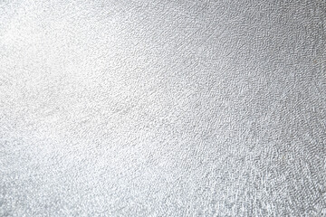 Fototapeta premium Shiny silver surface as background, closeup view