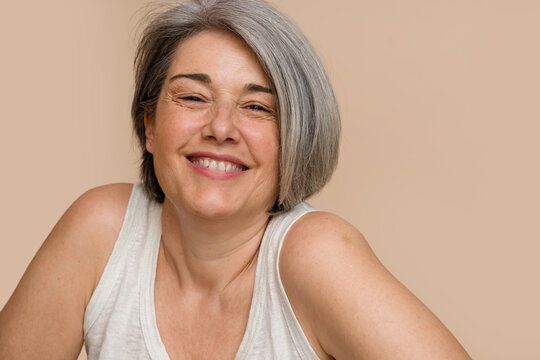 mature woman embracing aging gracefully