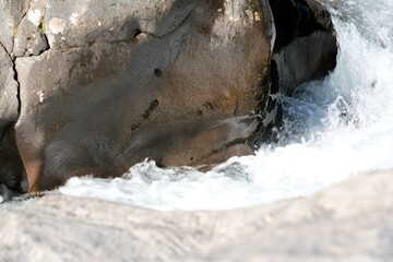 water flowing over rocks