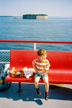 Child Rides on a Ferry Boat in Casco Bay, Portland, Maine