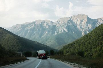 Beautiful road among mountains and forests