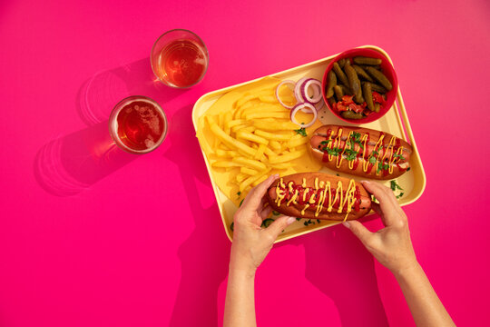 Fast, finger food: hotdog, nachos and French fries.