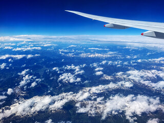 Aerial View of German Alps with Plane Wing