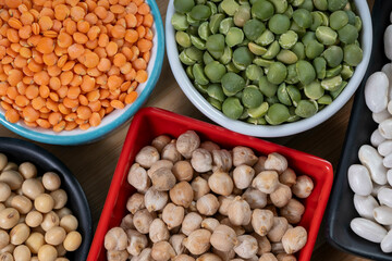 several pots with raw grains for preparing healthy food