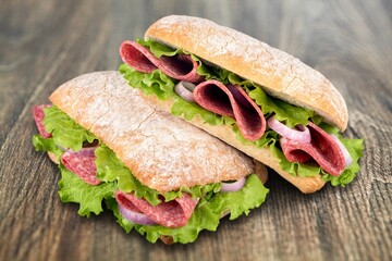 Tasty fresh big sandwich with ham, and vegetables