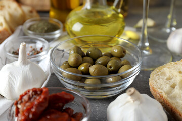 The concept of Italian cuisine, a plate with olives.