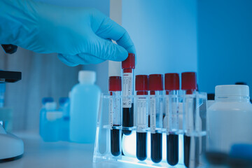 working atmosphere in the laboratory, chemistry and science specialist working in a lab with various experimental equipment and substances, experimental professional working in the lab