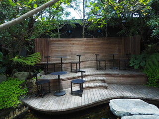 Table and chair in small garden or park. Famous rest and relax area in the city. 