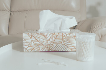 Tissue box and cotton swab in the living room