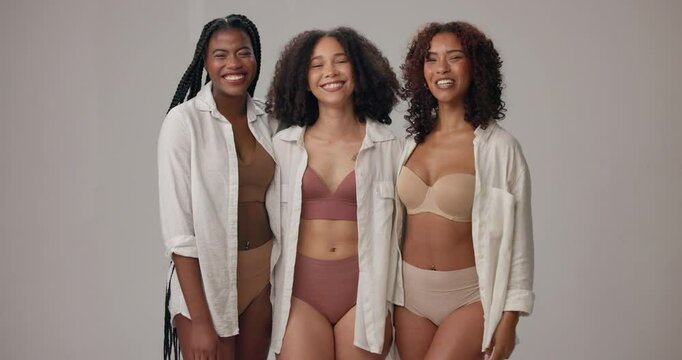 Underwear, happy and face of women in studio for wellness, beauty and body positivity. Diversity, lingerie and portrait of people in bra with confidence, healthy and inclusion on gray background