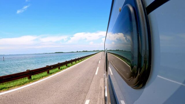POV: Caravan on italian road in summer 