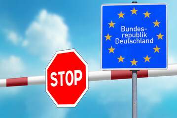 Grenzübergang zu Deutschland und eine Schranke mit einem Stoppschild als Symbol für die geschlossene Grenze
