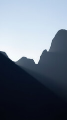 Naklejka premium Silhouette of Mountains at Dawn