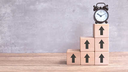 Ascending Time Concept with Clock and Arrow-Stamped Blocks