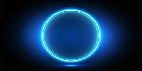 Obraz premium Circular blue ring glowing on dark background with radiant blue center light