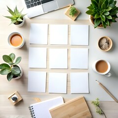 A flat lay mockup featuring nine blank white squares arranged on a wooden surface. surrounded by various office essentials like a laptop. a notebook. potted plants. and coffee cups.
